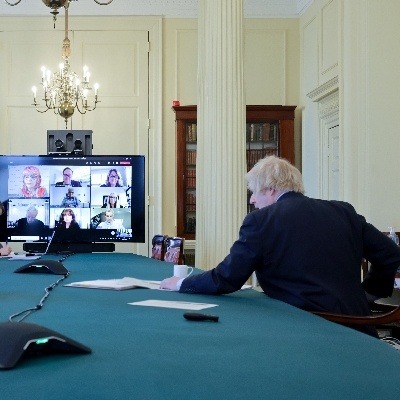 Oxfordshire hairdresser Anne Veck speaks with Prime Minister Boris Johnson