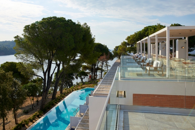 Rooftop terrace overlooks an infinity pool at Elivi Skiathos