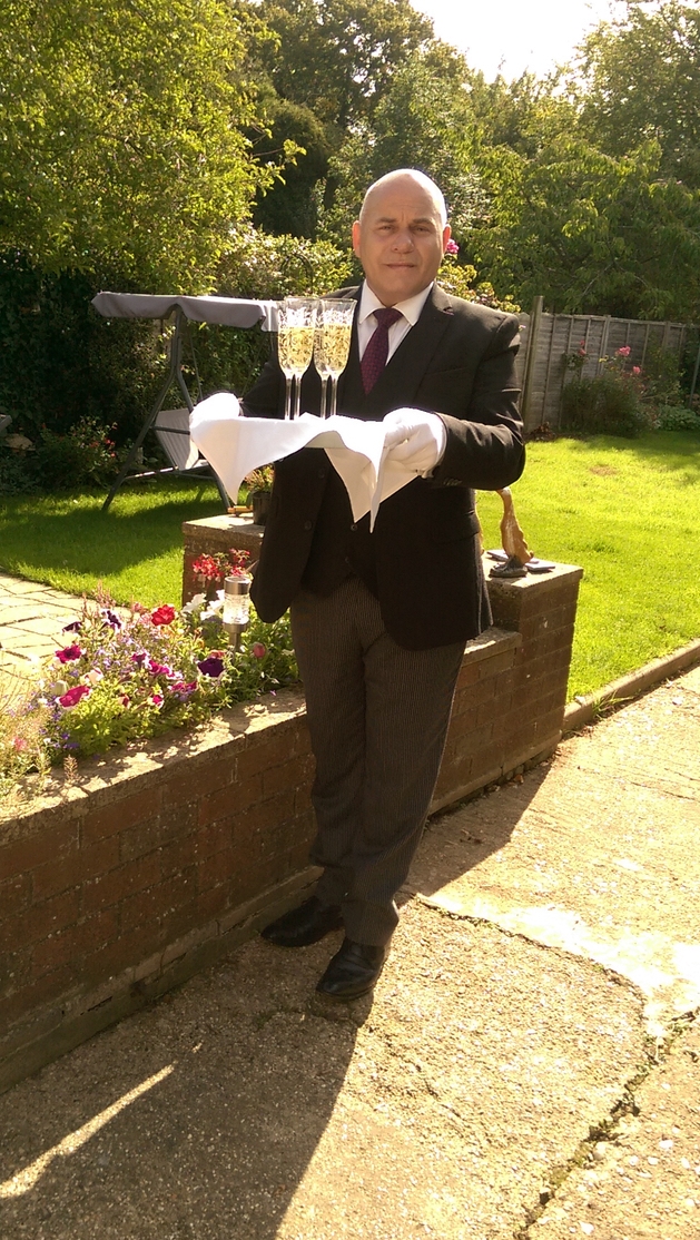 Nicholas Yon of Yon Events offers butler service ideal for a micro wedding catering.