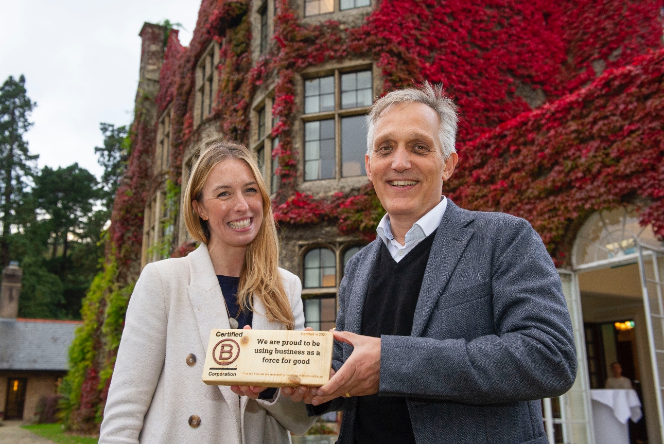 Danny Pecorelli and Kate Sandle pose with B Corp certification