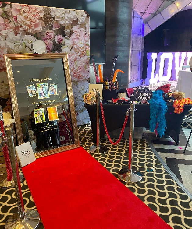 magic mirror with red carpet and props