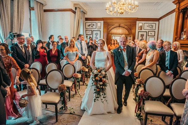 Bride walking down aisle