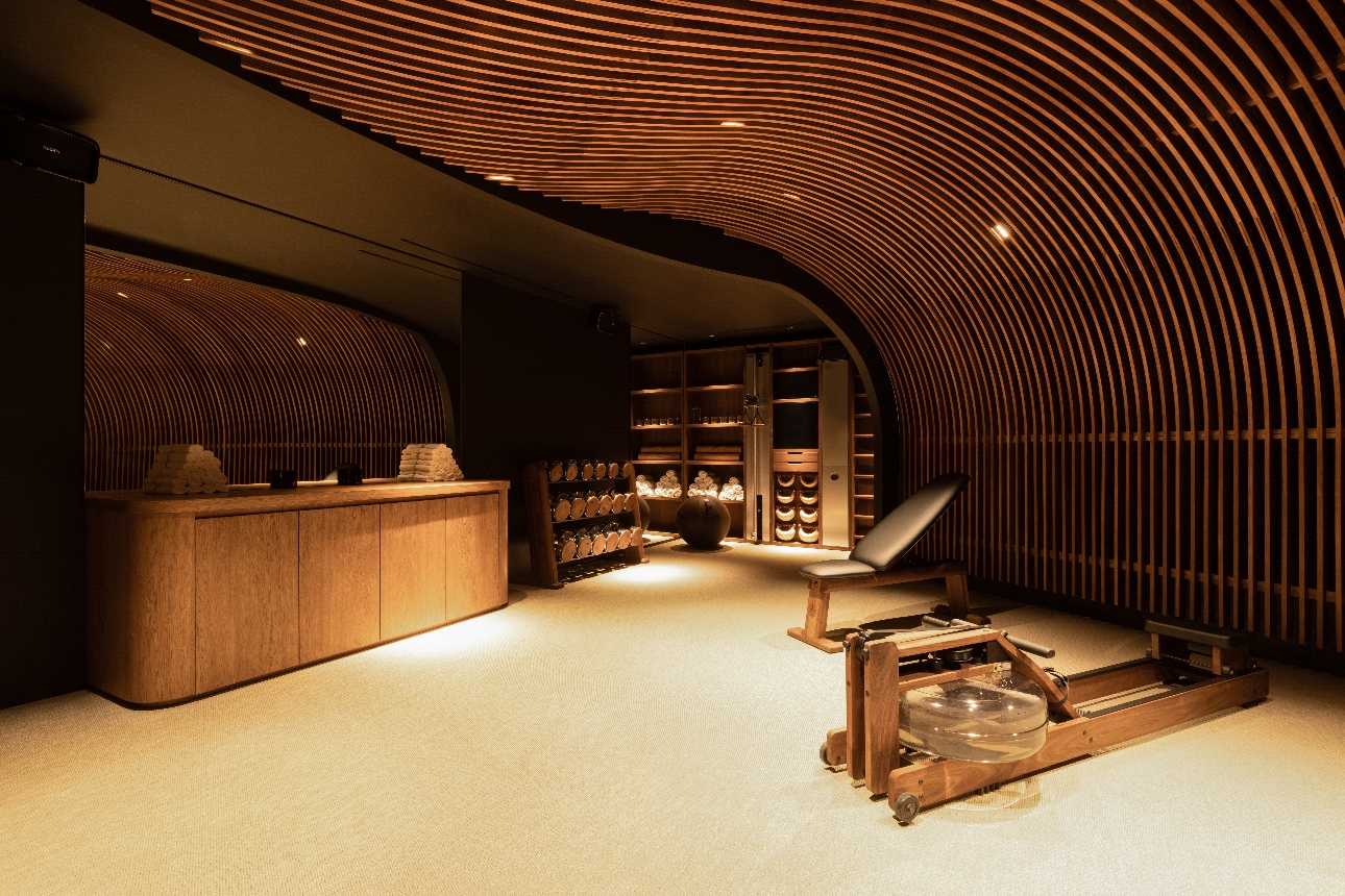 spa room, curved wooden panelling from walls through to ceiling