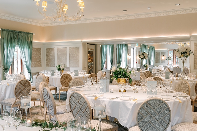 reception suite ivory in colour with large round tables and neutral chairs 