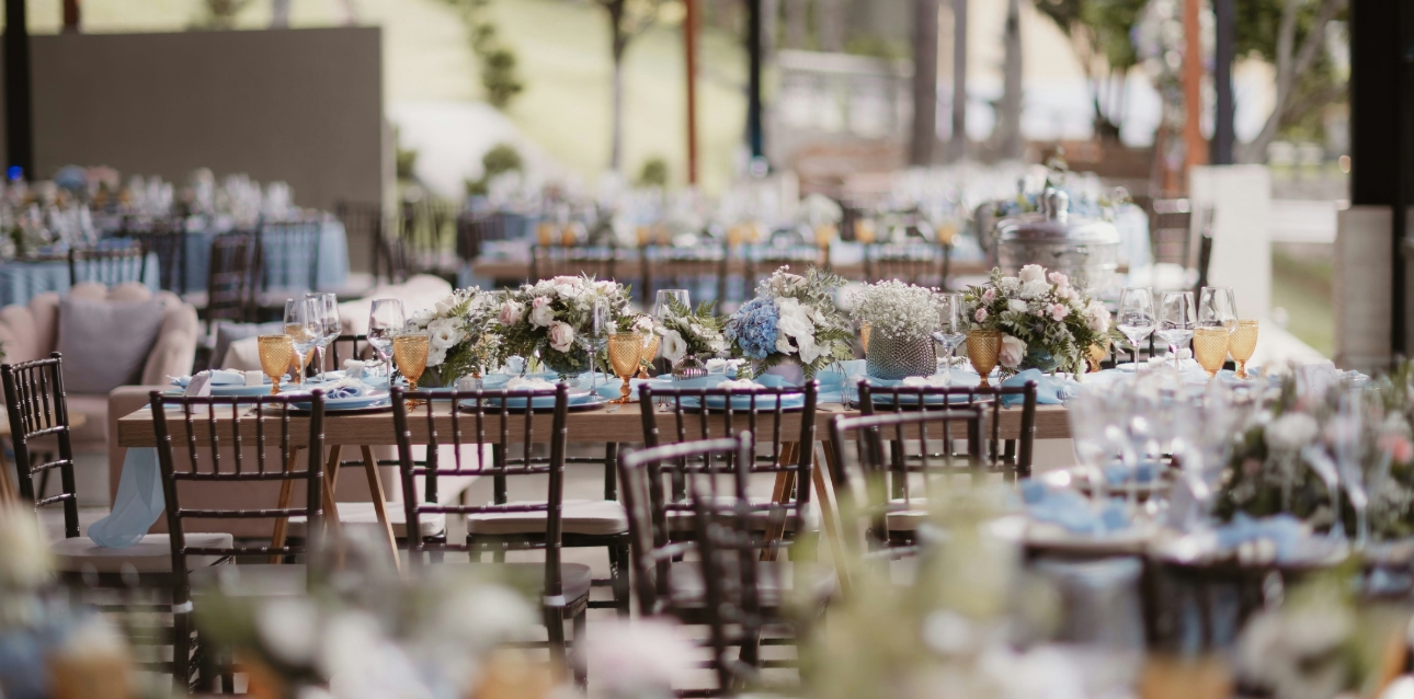 wedding venue set up with blue and yellow decor