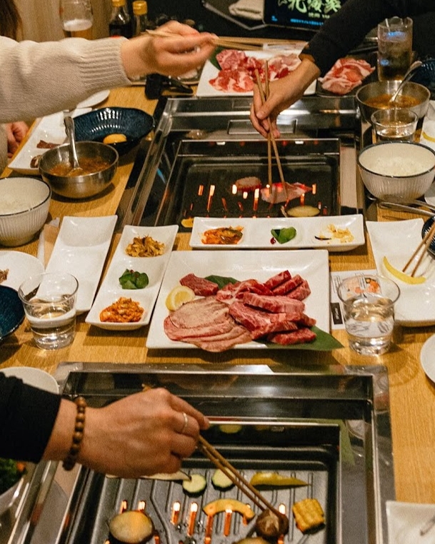 group of people enjoying some dinner
