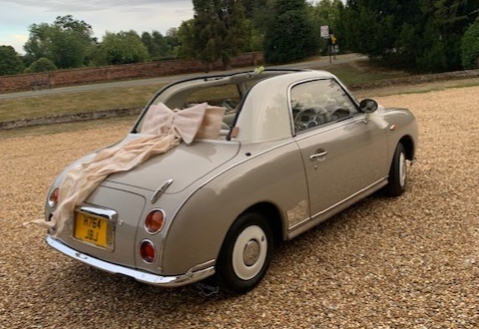 Little Charlie Nissan Figaro vintage car